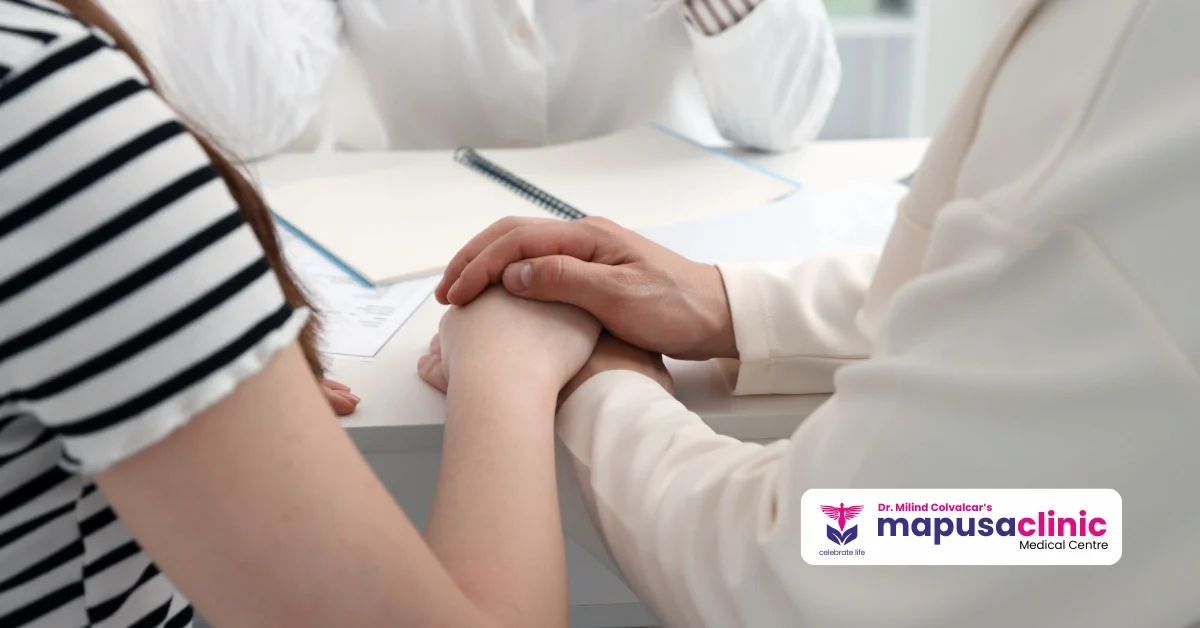 Dr. Milind Colvalcar, IVF Specialist in Goa, consulting with a couple about advanced infertility treatment at Mapusa Clinic.